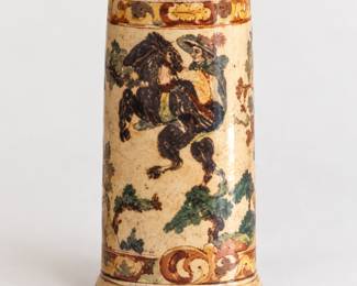 Tall ceramic umbrella stand featuring a horse-and-rider scene, decorative scroll borders, and warm earth tones.