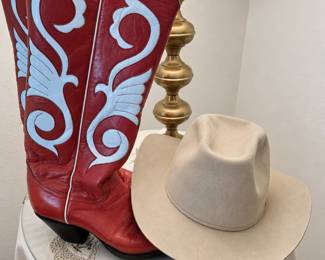 WESTERN ◆ BOOTS & ACCENTS  Tall red cowboy boots with pale blue scrollwork ◆ Tan felt cowboy hat ◆ Brass-tone table lamp with cream shade ◆ Embroidered table covering.