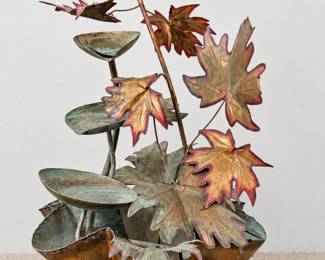 Decorative tabletop fountain with sculpted maple leaves, cascading bowls, and copper and verdigris tones.