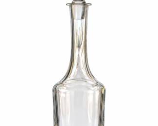Tall plain glass decanter with rounded shoulders, a long neck, and tapered stopper.