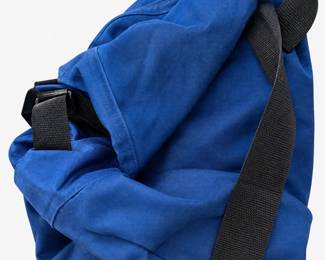 Blue fabric carry bag with black straps