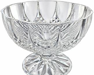 Clear cut-glass pedestal bowl with paneled sides and a starburst foot.
