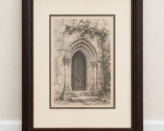 Framed Architectural Artwork Monochrome drawing of a spired building in a dark frame.