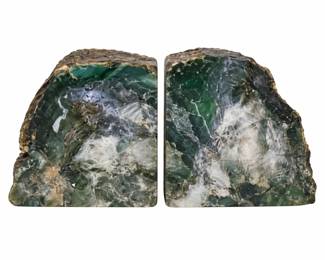 Stone bookends with irregular edges and green, gray, and white coloring.