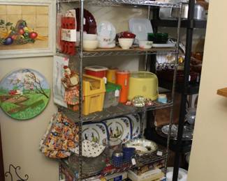 Included Brands - Baileys, Kahlua, Hazel Atlas, Fireking, Homer Laughlin, Better Homes and Gardens, Tupperware, Bartlett Collins, & Henriot Quimper - Some Pieces Include - Glasses, Tea Cups & Saucers, Plates, MCM Wood Candlestick Holders, Fondue Pot, Cake Carrier, Tin Tray, and Games & Puzzles