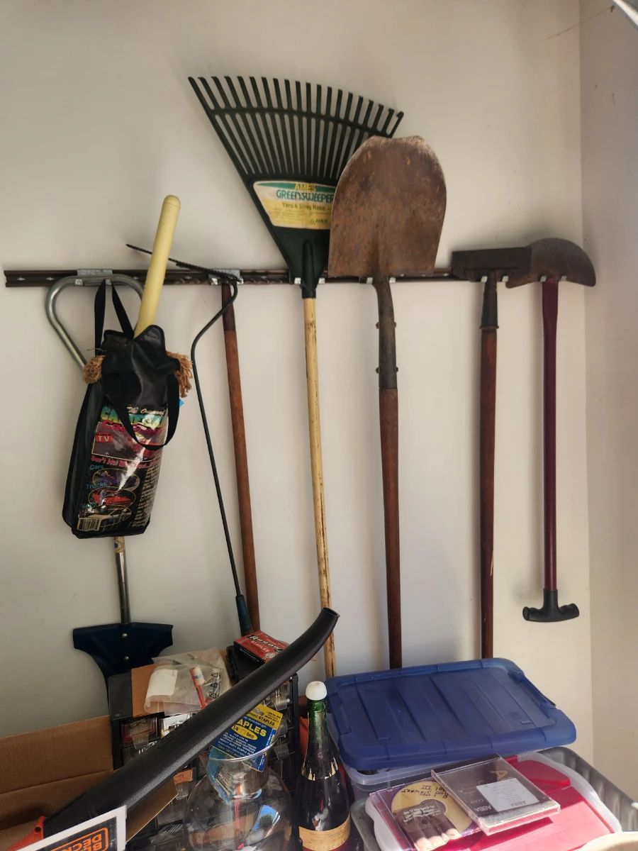Estate-sale contents displayed in Williamsburg, listing photograph 3 from a sale featuring furniture, collectibles