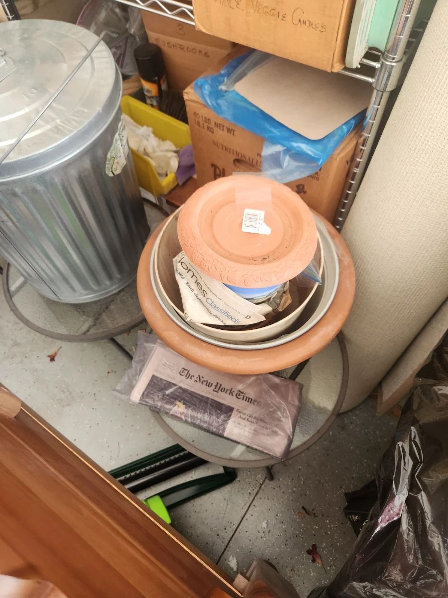 Estate-sale contents displayed in Williamsburg, listing photograph 2 from a sale featuring furniture, collectibles