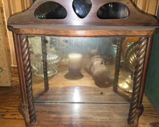 vintage wooden wall curio display shelf featuring a mirrored back and barley twist side spindles