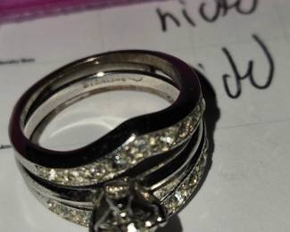 bridal ring set featuring a contour/guard band stacked with a solitaire or accent stone ring