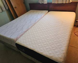 twin beds set up as king. 