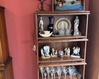 Display Shelves With Figurines And Glassware