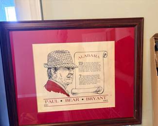 framed commemorative print honoring legendary Alabama Crimson Tide football coach Paul "Bear" Bryant, featuring a portrait of him in his signature houndstooth hat alongside an inspirational quote and his lifespan dates (1913–1983)