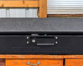 Black truck-bed storage cabinet for Ford Bronco
