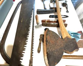 Assortment of vintage woodworking and farm tools