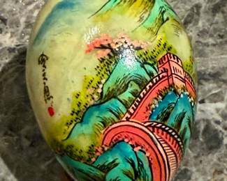 1920s white jade hand painted egg featuring the Great Wall of China