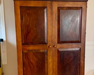 Very nice tv stand or could be converted to an armoire