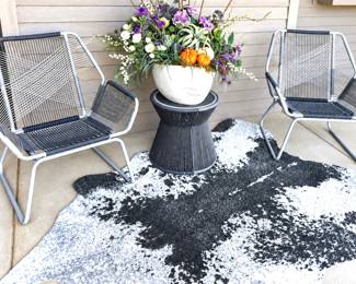 Contemporary patio set featuring two woven cord armchairs