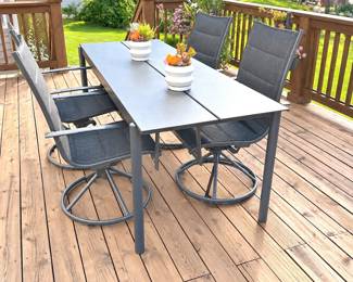 Steel Knoll Muuto Linear patio table with 4 chairs