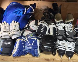 Assorted used hockey and sports equipment