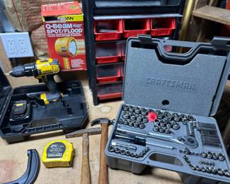 Variety of tool sets and assorted hand tools, including Craftsman sockets and a DeWalt cordless drill kit