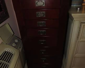 Tall free standing jewelry chest.