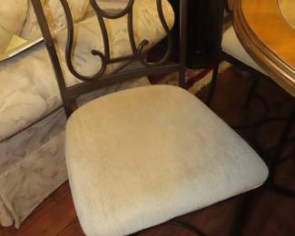 Chairs with matching marble insert.