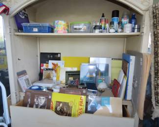 Art supplies, paper,brushes, canvasses, paints and paint books.