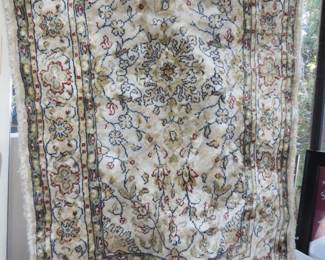Small silk hearth rug.