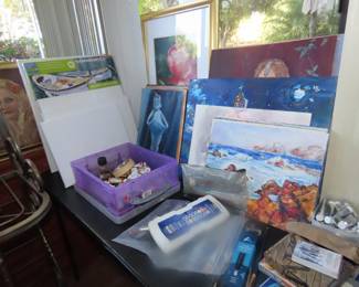 Art supplies, paper,brushes, canvasses, paints and paint books.