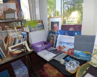 Art supplies, paper,brushes, canvasses, paints and paint books.
