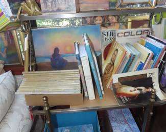 Art supplies, paper,brushes, canvasses, paints and paint books.