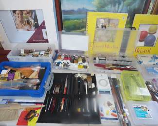 Art supplies, paper,brushes, canvasses, paints and paint books.