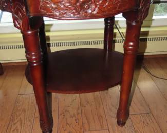End table with green marble top.