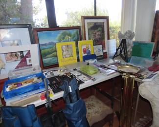 Art supplies, paper,brushes, canvasses, paints and paint books.
