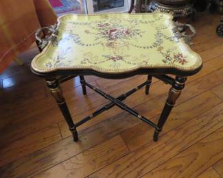 Removable enamel/metal tray on wooden frame.