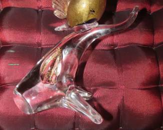 Murano glass bird on branch.