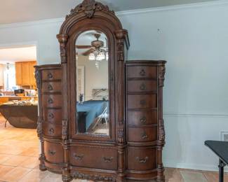 Beautiful dark stained wood 4 piece dresser in perfect condition.