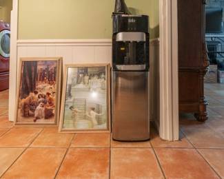 Brita filer holds 5 gal and dispenses hot and cold water.