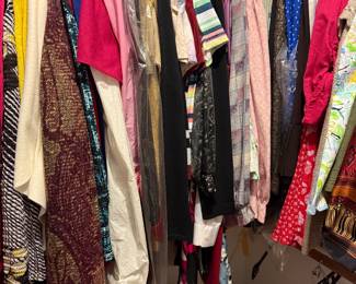 Walking closet, full of womenโs clothing