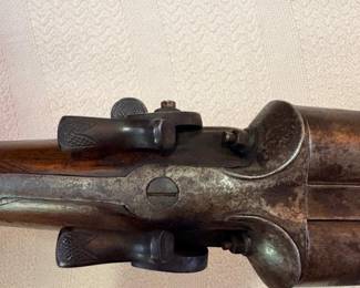 1800s double-barrel shotgun marked “Wm. Moore & Co.”,