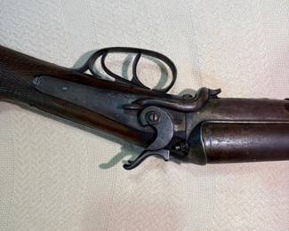 1800s double-barrel shotgun marked “Wm. Moore & Co.”,