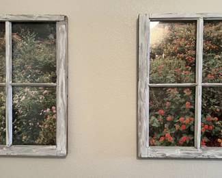 Pair of rustic wall art pieces featuring garden scenes framed in distressed, white-washed wooden window panes.