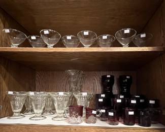 Assorted clear and ruby glasses