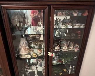 Lots of vintage and antique toys, dolls and collectibles. Beautiful mahogany curio cabinet