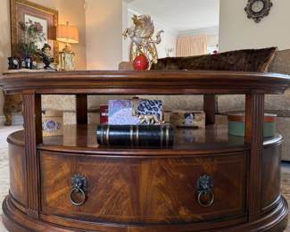 Glass-top Oval Coffee Table w/ Lion Head Pulls