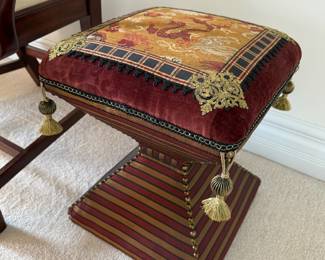 Upholstered hourglass ottoman with dragon tapestry