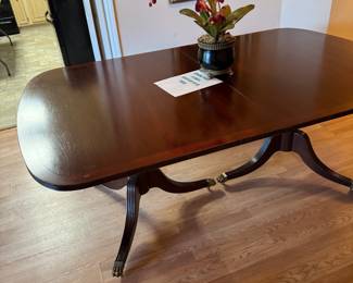 Dining table seats up to 10 with two leafs 