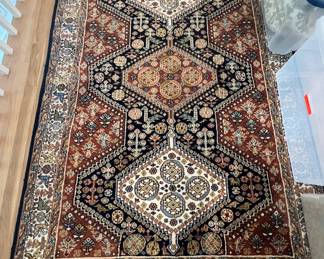 120. Handwoven Wool Rug (4'2" x 6'3")