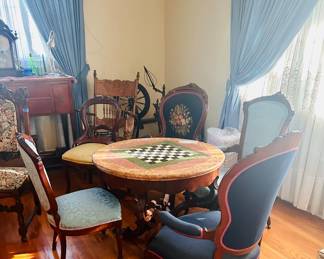 game table, inlaid chessboard top, chairs