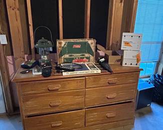 Various Camping items and Dresser . Basement location 